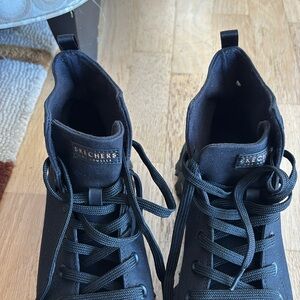 Black High-Top Sneakers/ Sketcher’s